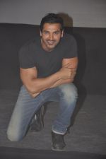 John abraham lifts a bike at Force Promotions in Mehboob, Mumbai on 27th Sep 2011 (44).JPG